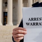 arrest warrant defense attorney felony misdemeanor